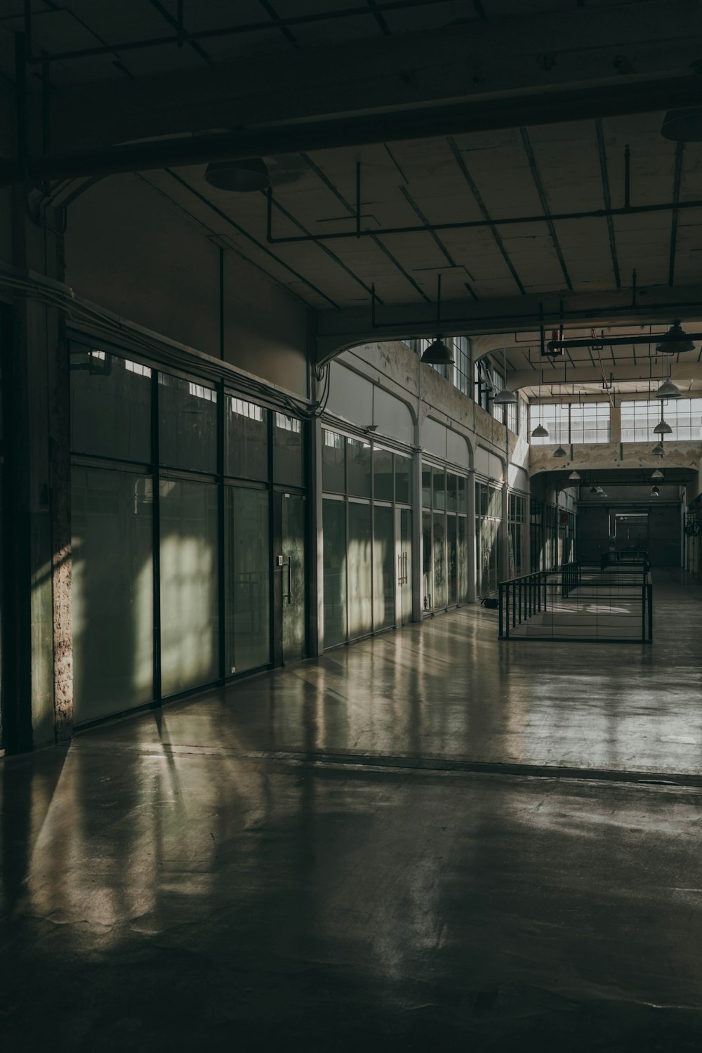 empty hallway with glass windows