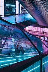 people walking on glass building