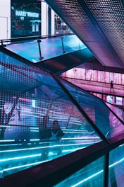people walking on glass building