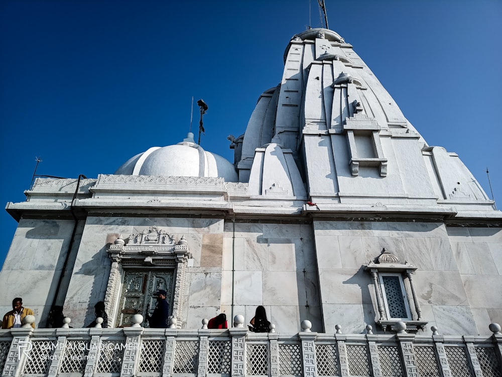 white concrete building under blue sky during daytime