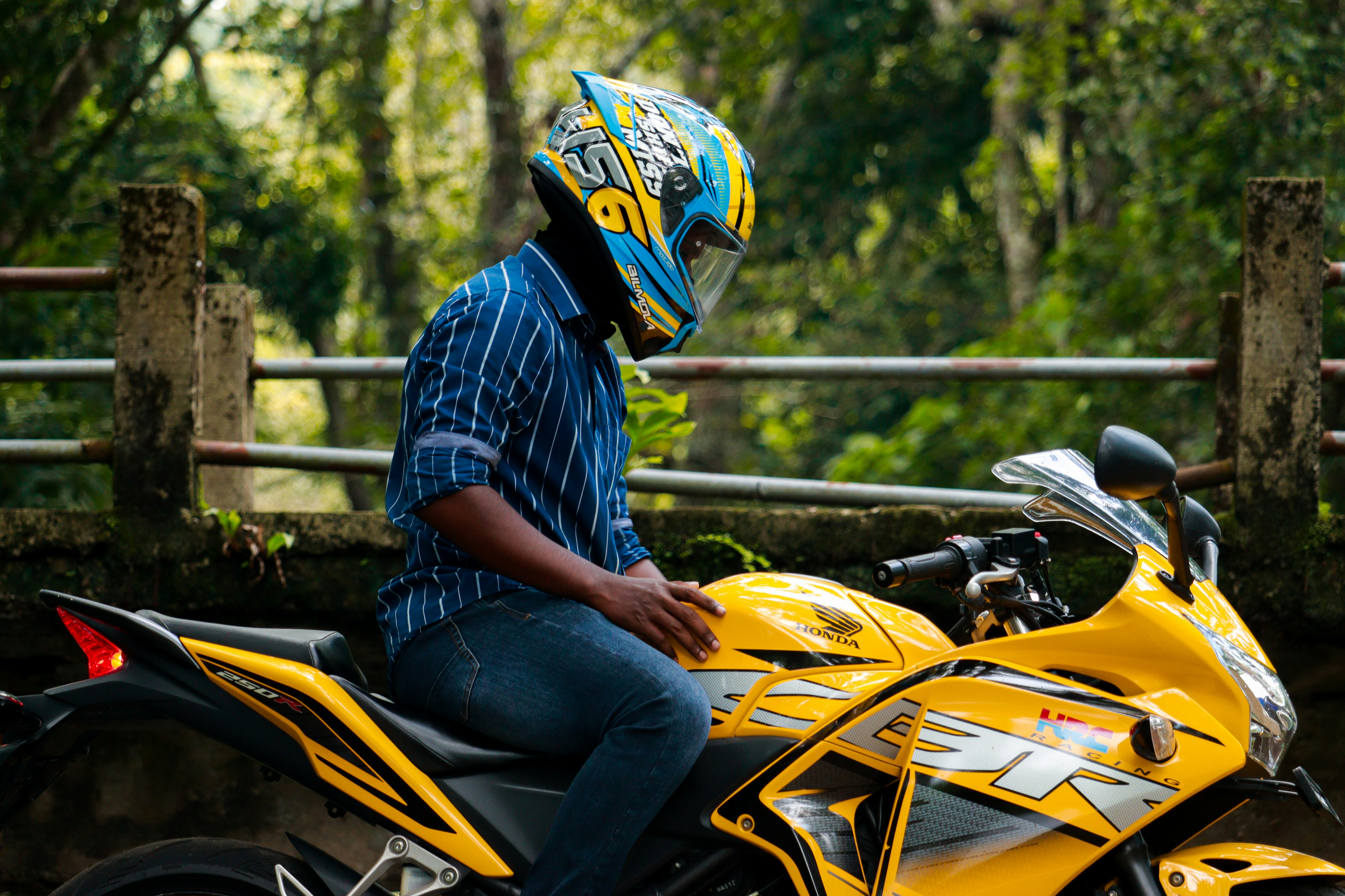 Man In Blue And Black Jacket Riding Motorcycle On Road During Daytime Photo Free Muthanga Image On Unsplash