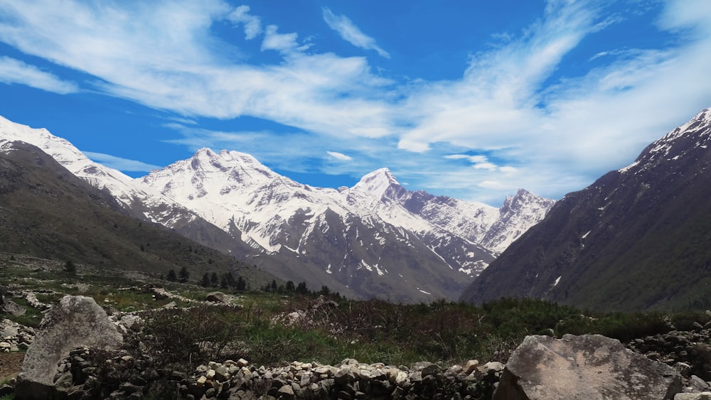 snow covered mountains under blue sky during daytime