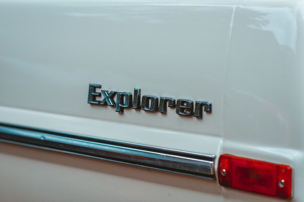 white and red chevrolet car