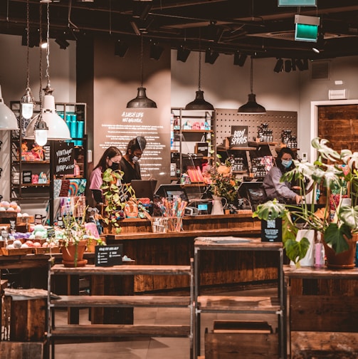 people standing in front of food counter