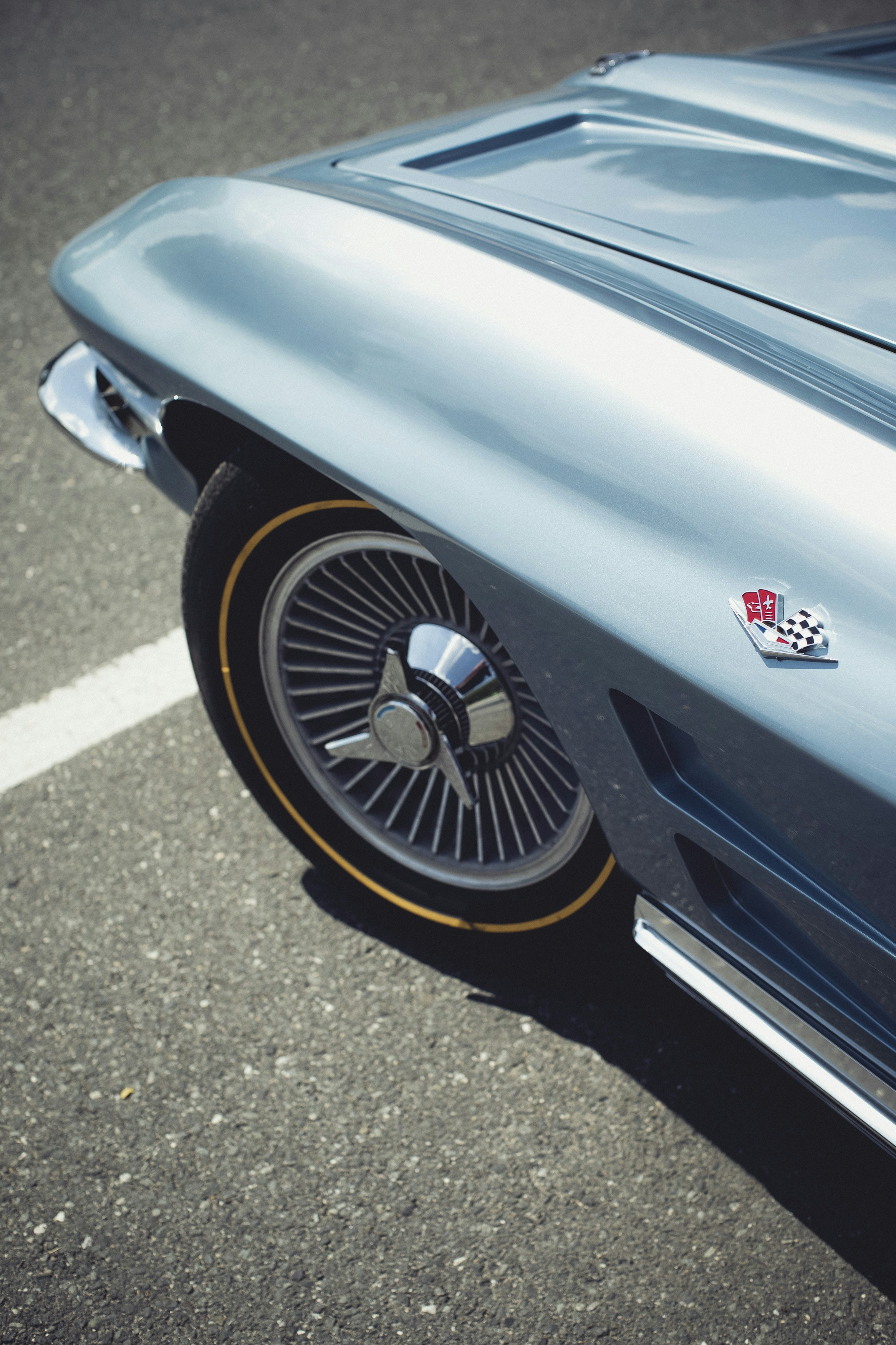 blue and silver car on road