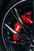 black and red car wheel