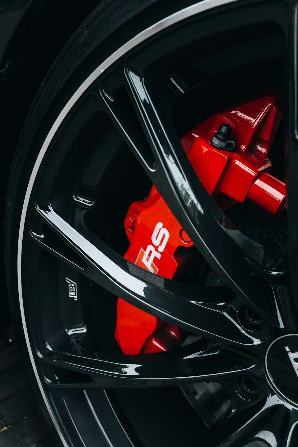 black and red car wheel
