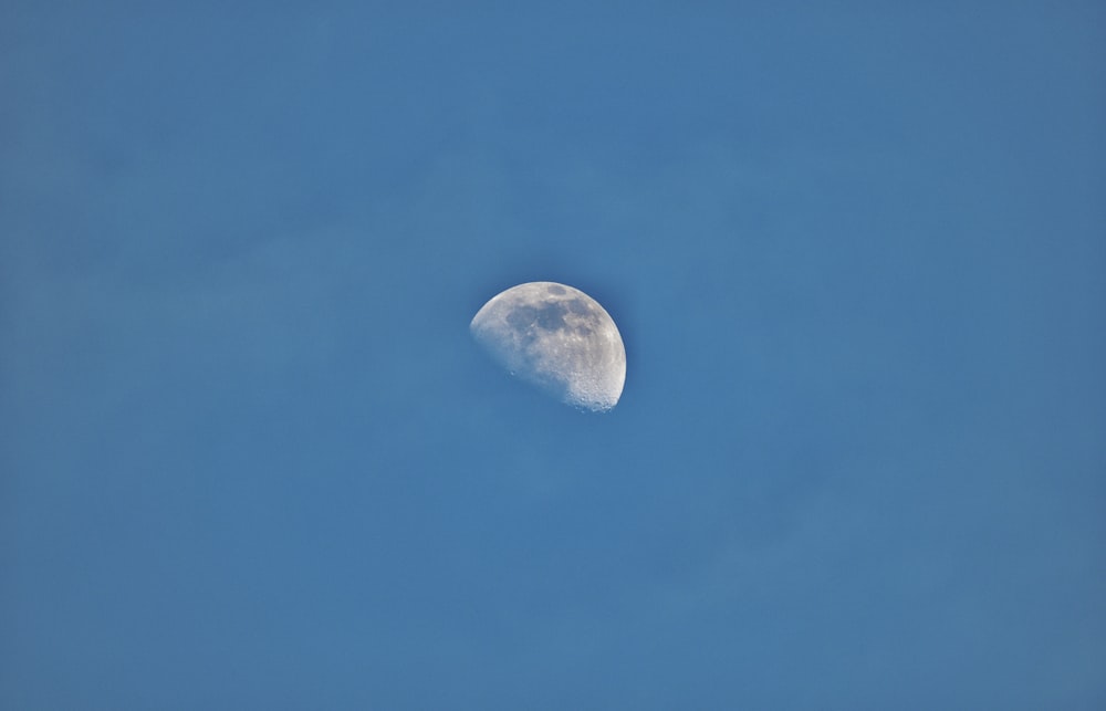 full moon in blue sky