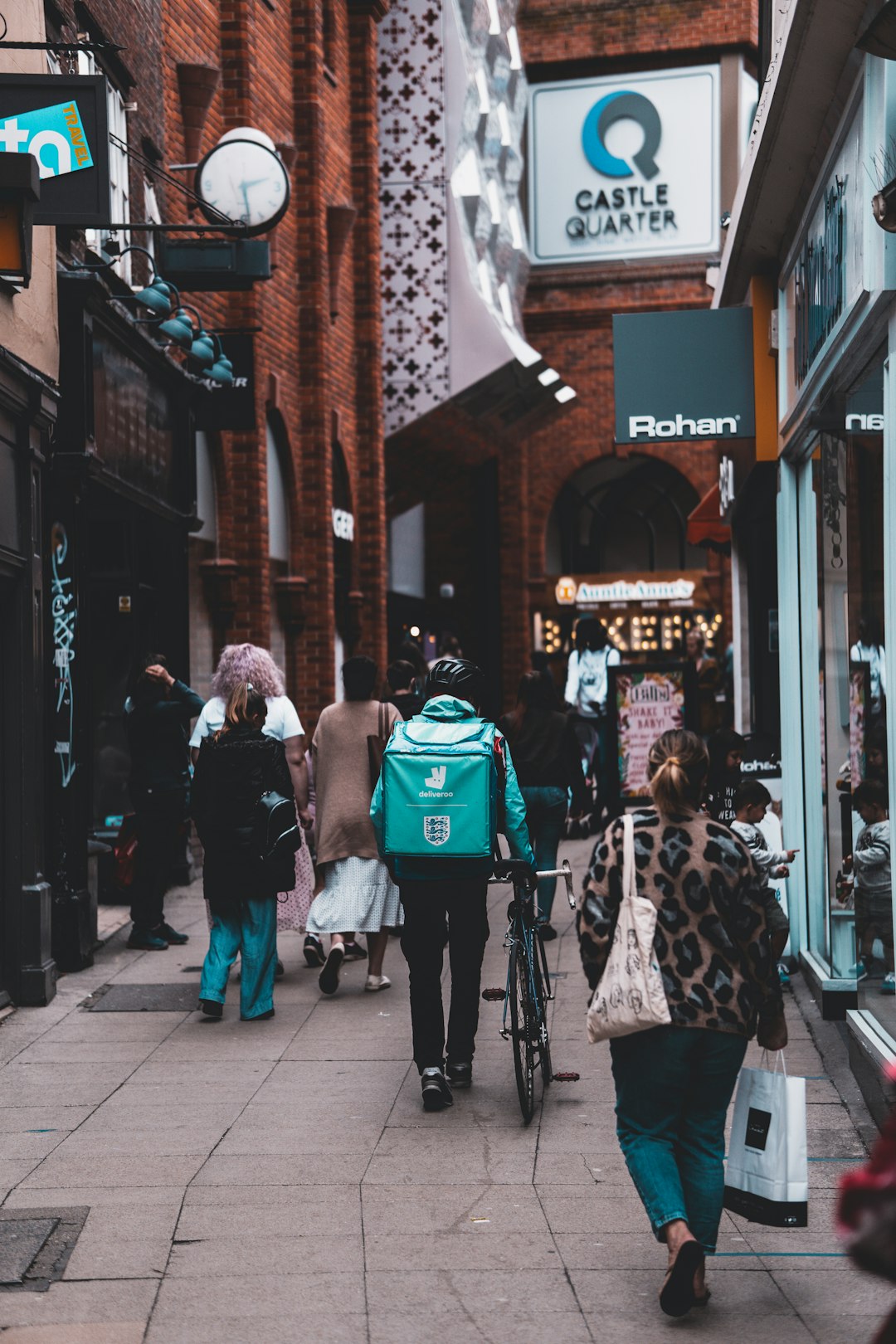 people walking on sidewalk during daytime