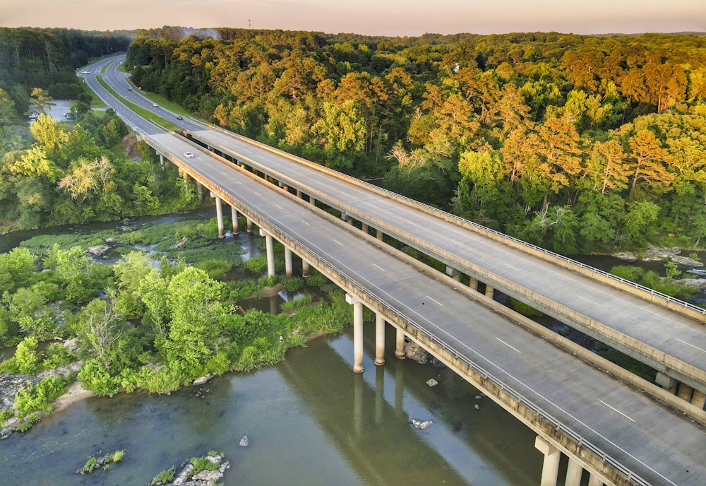 gray concrete bridge over river
