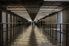 people walking on hallway during daytime