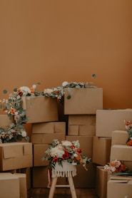 white and red flowers on brown cardboard boxes