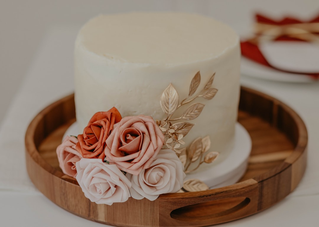 white and pink floral cake