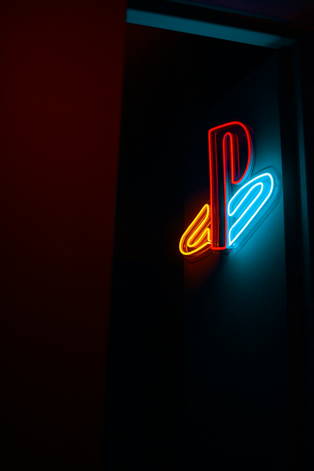 red and white open neon sign