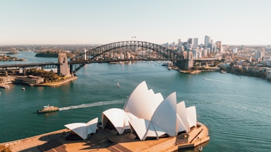 sydney opera house near body of water during daytime