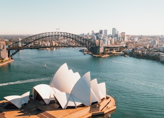 sydney opera house near body of water during daytime