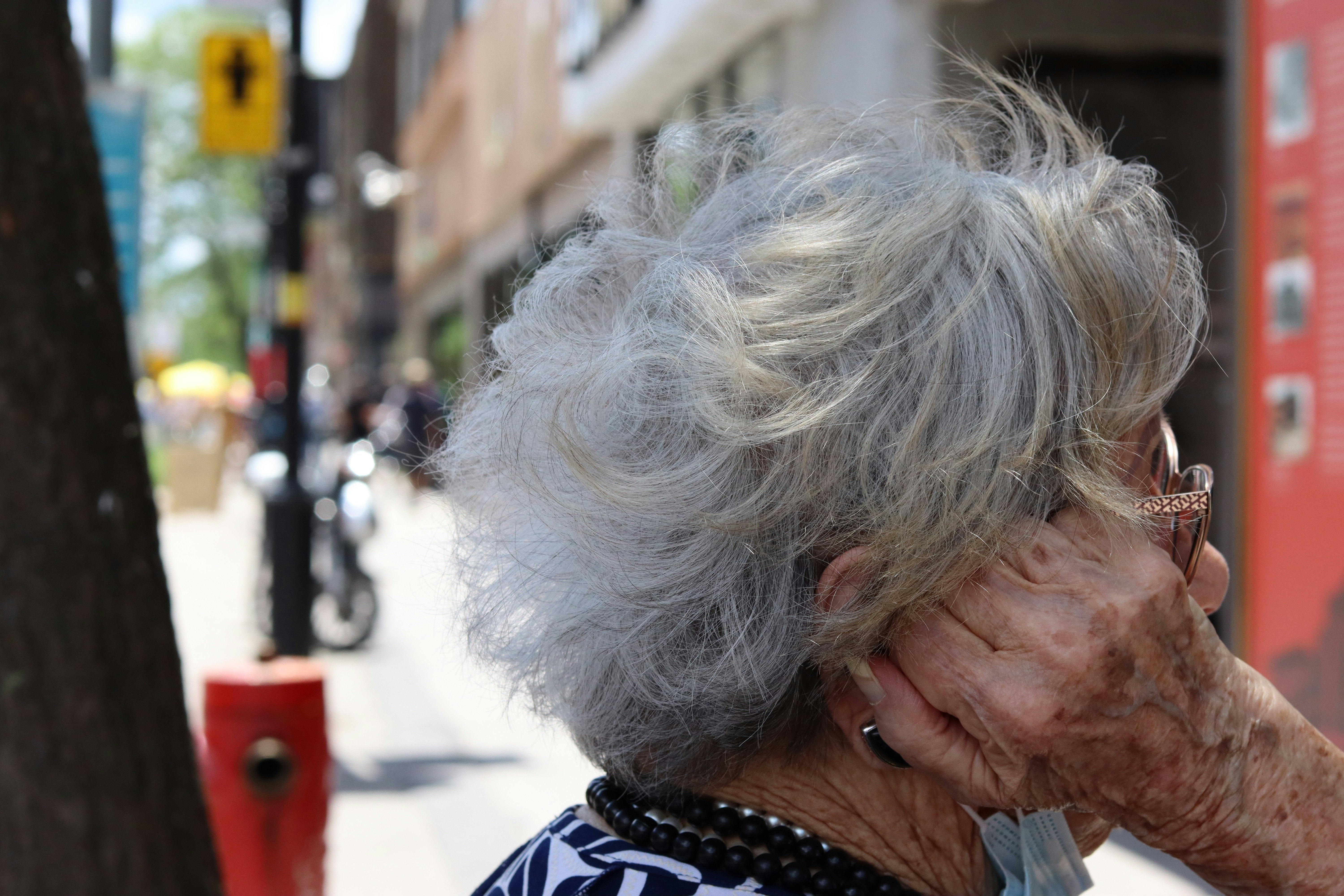 woman in black and white shirt with silver ring, Elderly people