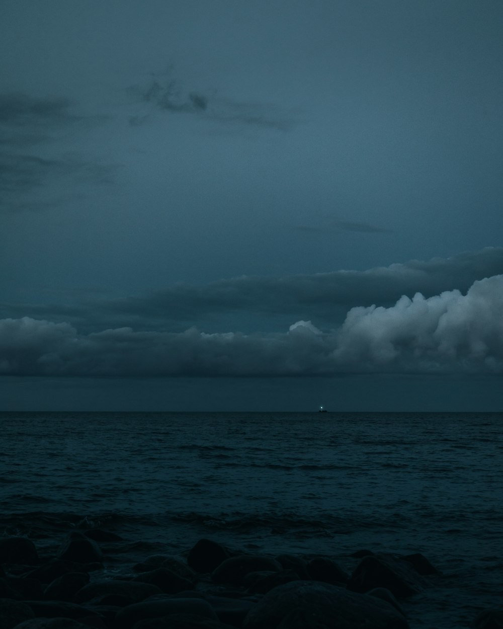 ocean under cloudy sky during daytime