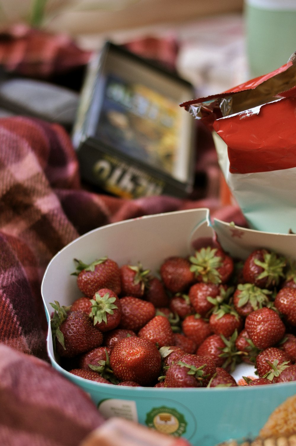 strawberries in white ceramic bowl