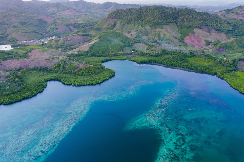 Qiandao Lake turquoise water with scattered green islands aerial view