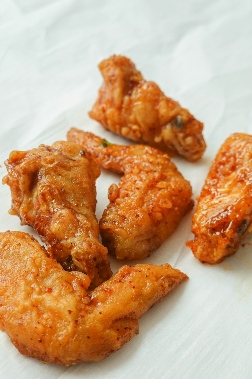 fried chicken on white paper