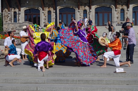 Colorful traditional dancers performing at a lively Rajasthan festival.