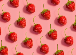 red strawberries on white background