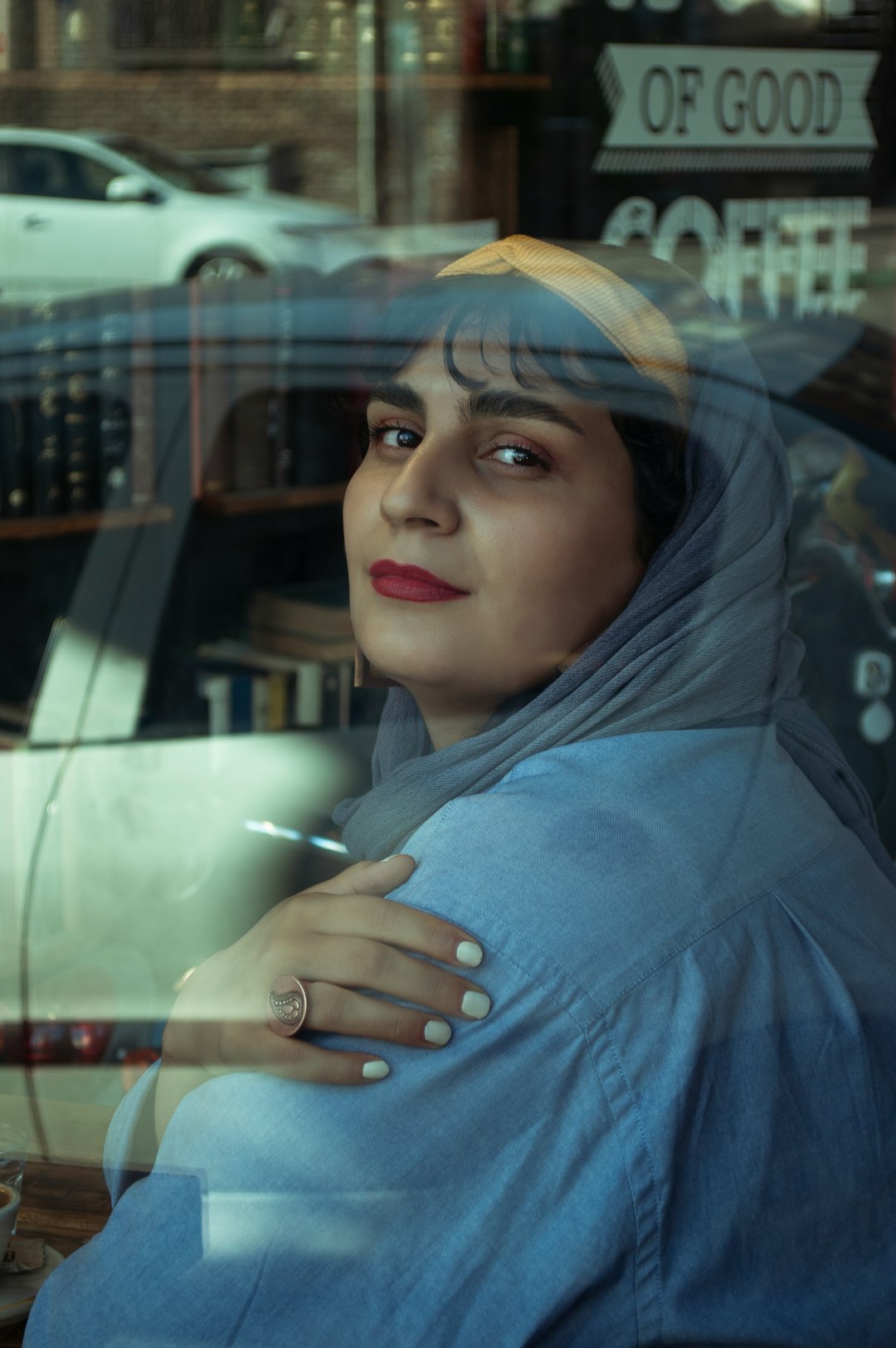 woman in blue hijab and blue abaya