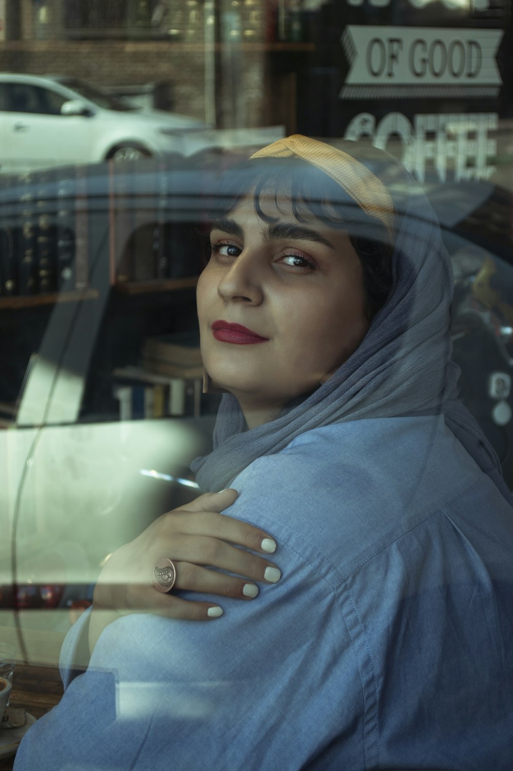 woman in blue hijab and blue abaya