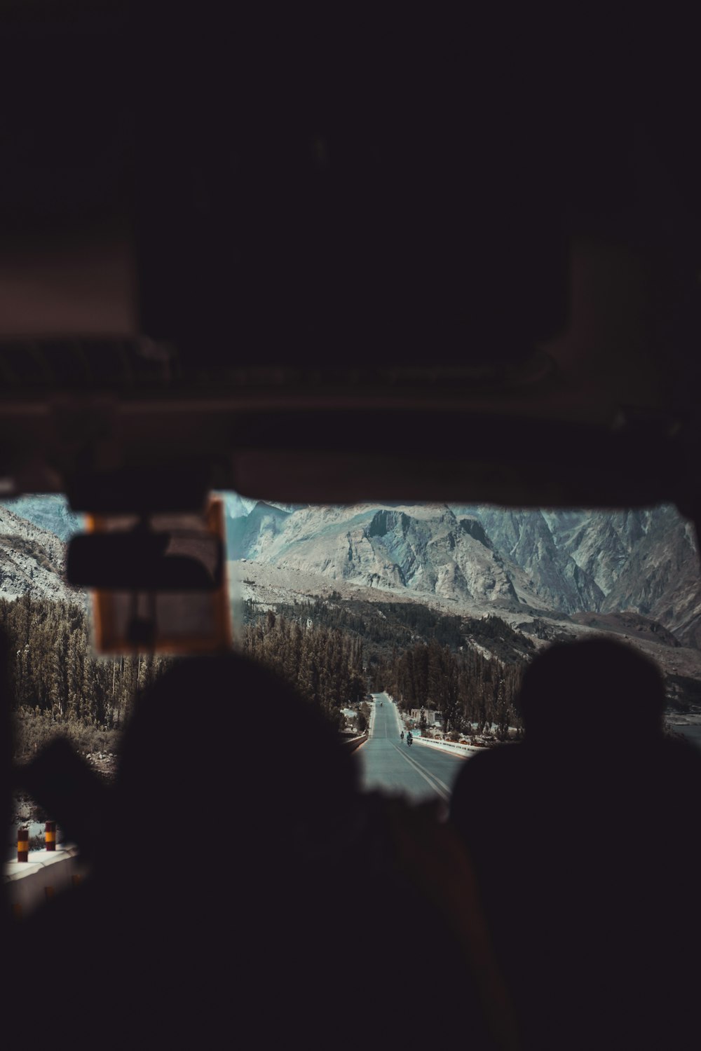 people standing on mountain during daytime