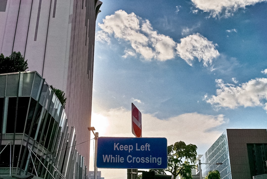 blue and white street sign