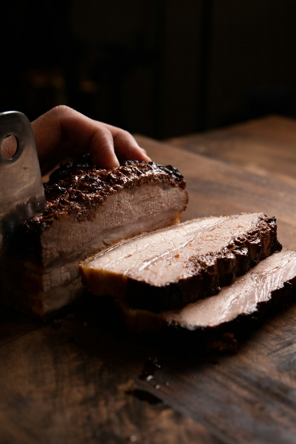 person holding sliced of bread