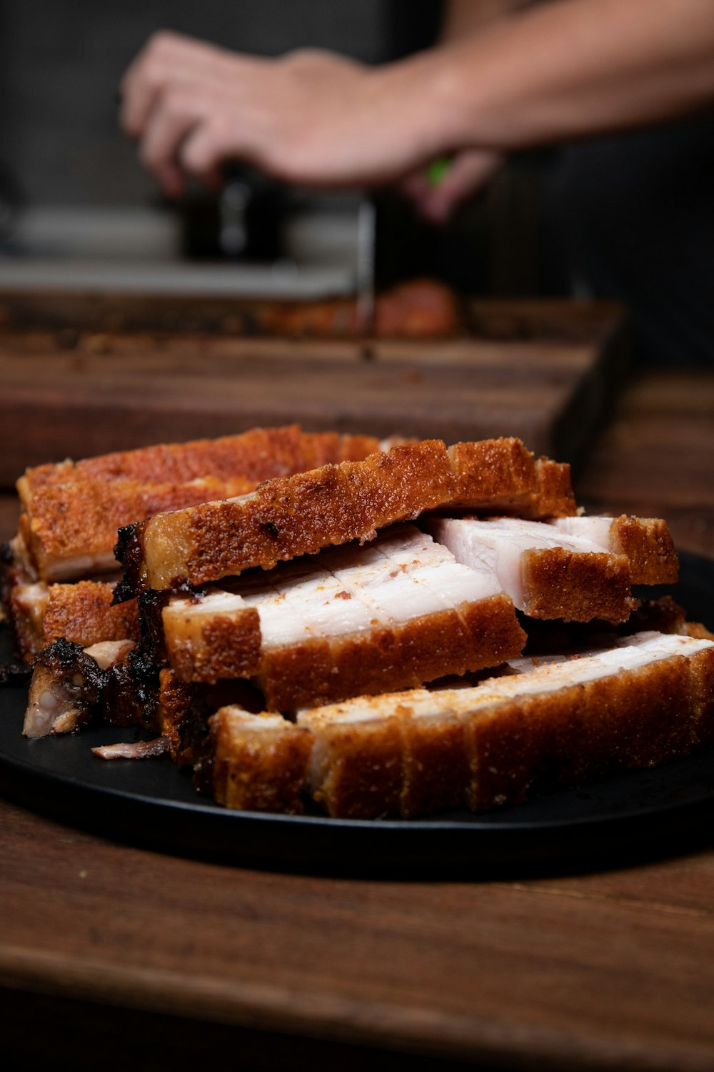 sliced bread on black plate