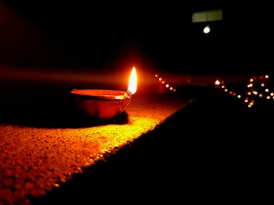 Traditional oil lamps glowing softly in the evening, creating a peaceful ambiance.