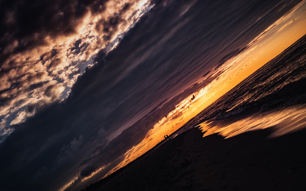 silhouette of mountain during sunset