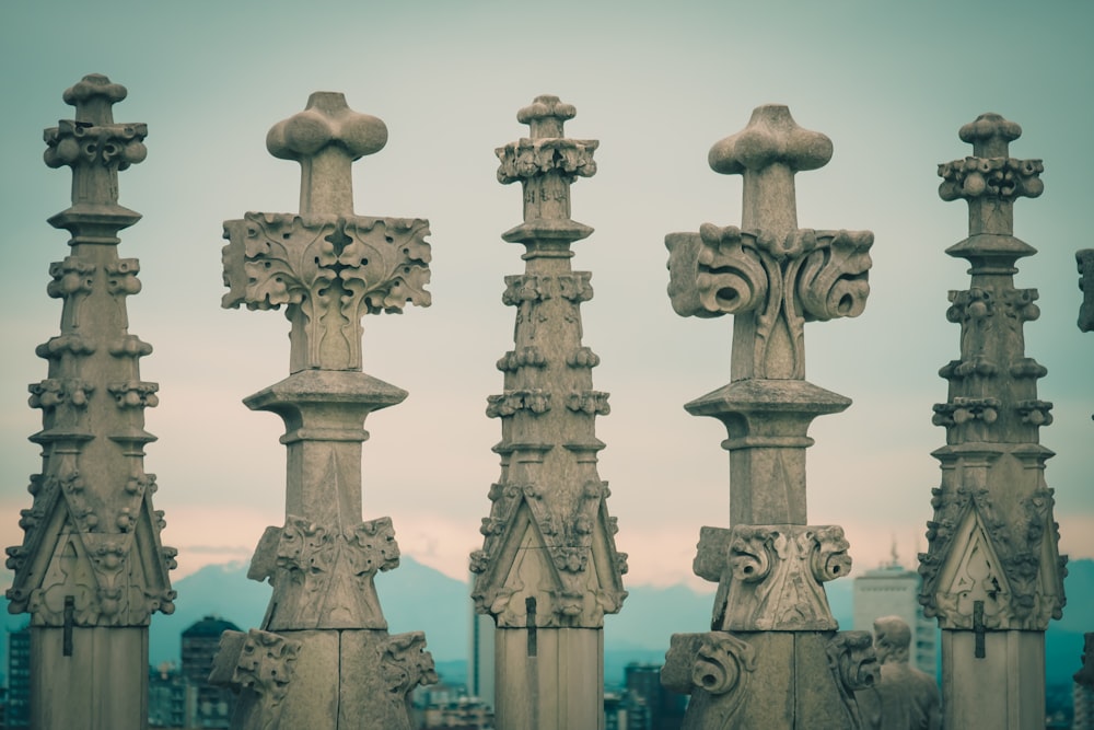 white and brown cross statue