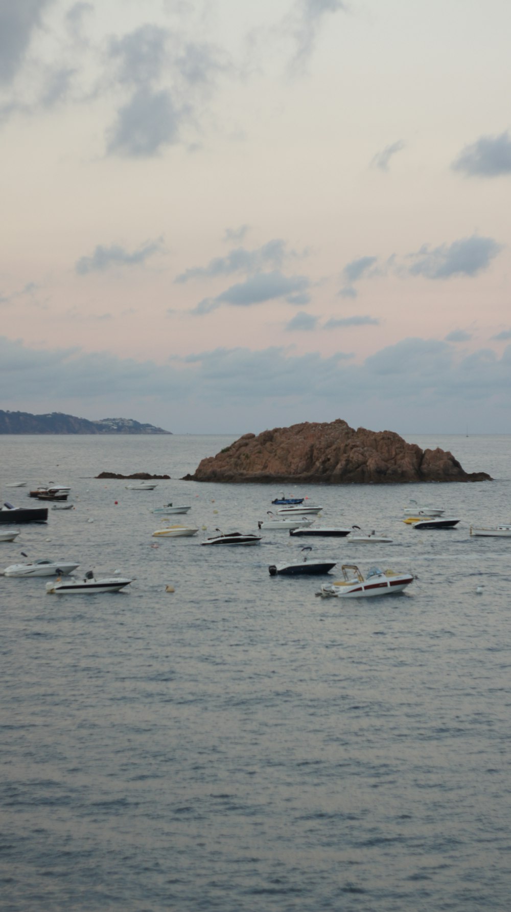 white and black boat on sea during daytime