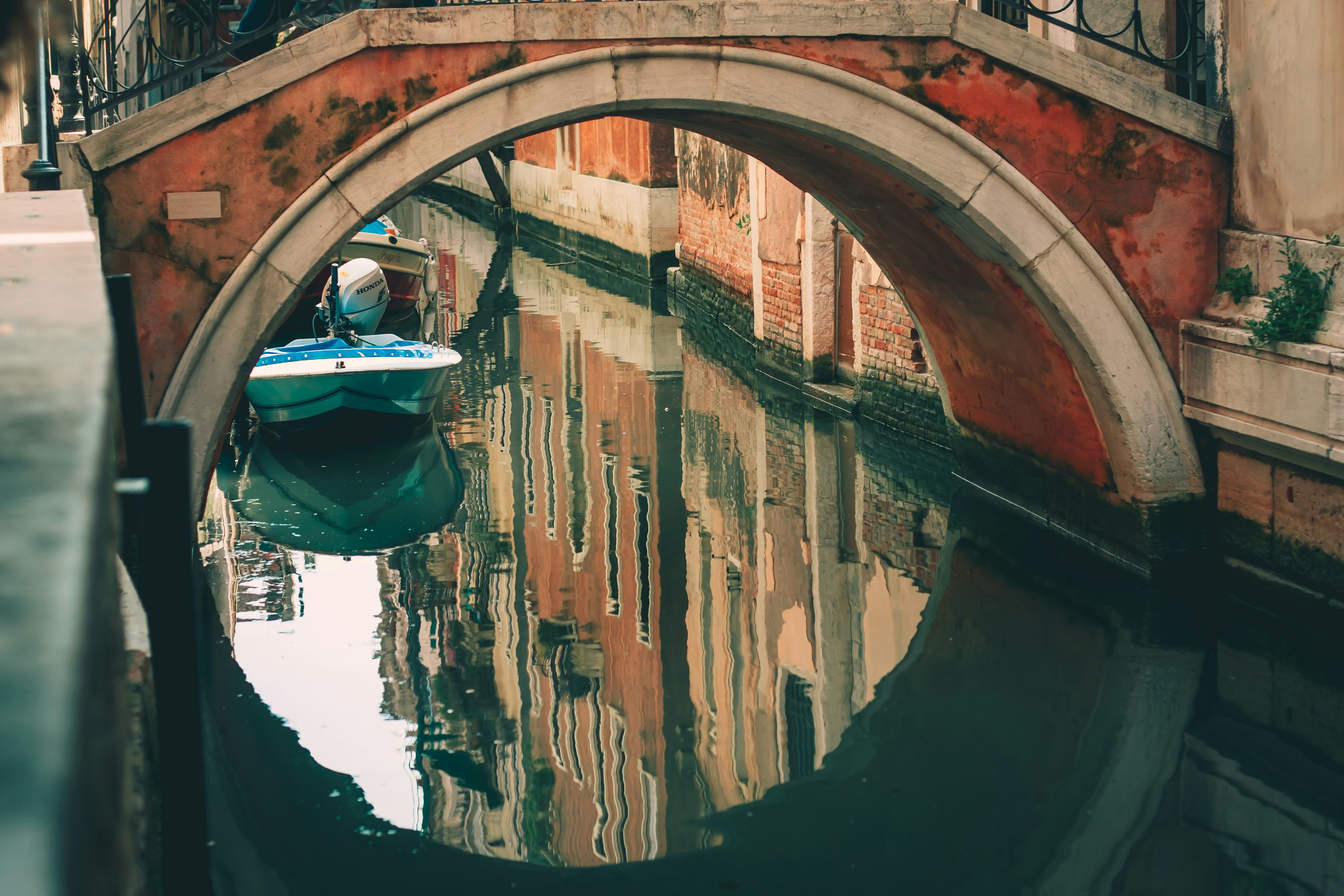 brown arch bridge over river
