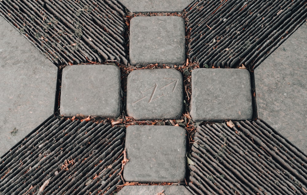 brown wooden blocks on black metal surface