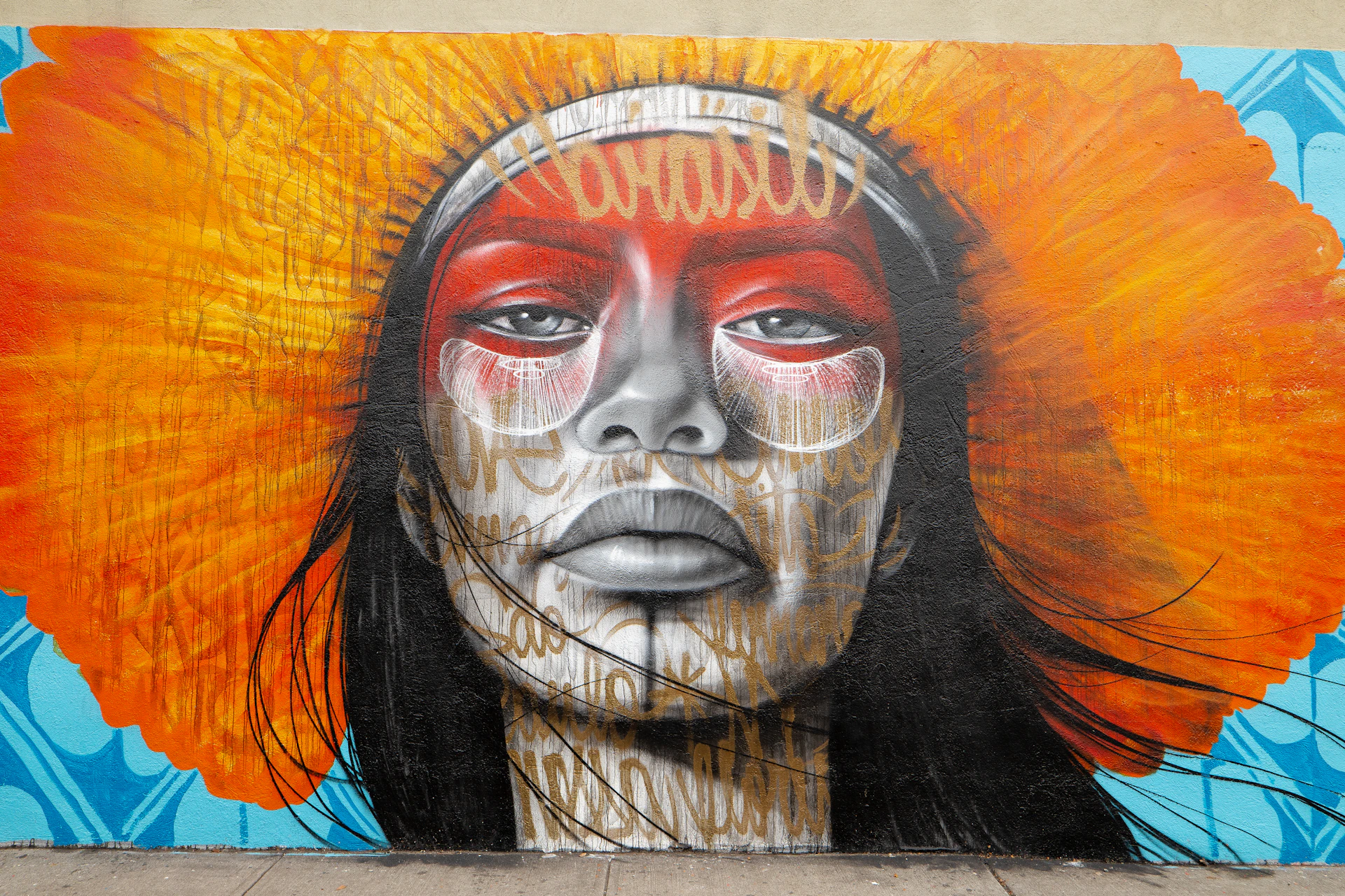 woman with brown hair painting