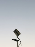 Battery units secured neatly inside a solar street light pole base.