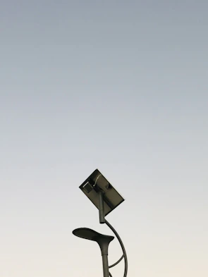 Decorative solar street lights lighting up a commercial area with modern design.