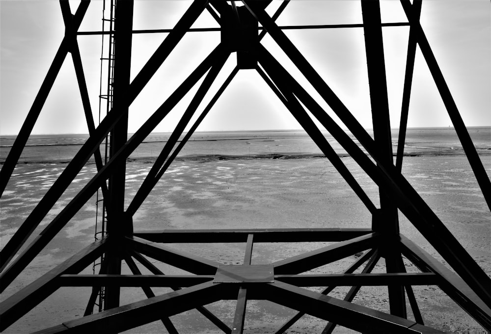 black metal frame on beach during daytime