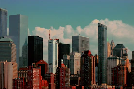 A vibrant city skyline with diverse buildings representing real estate.