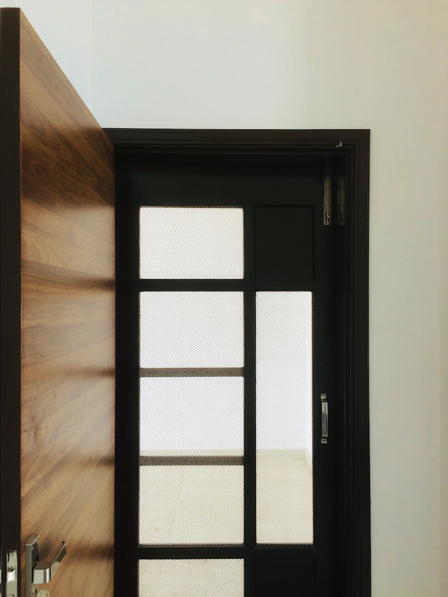 Black framed glass entry door
