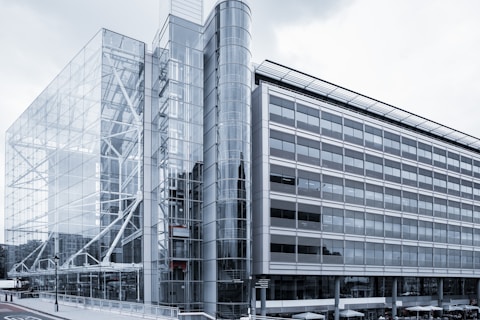 gray concrete building under white sky during daytime