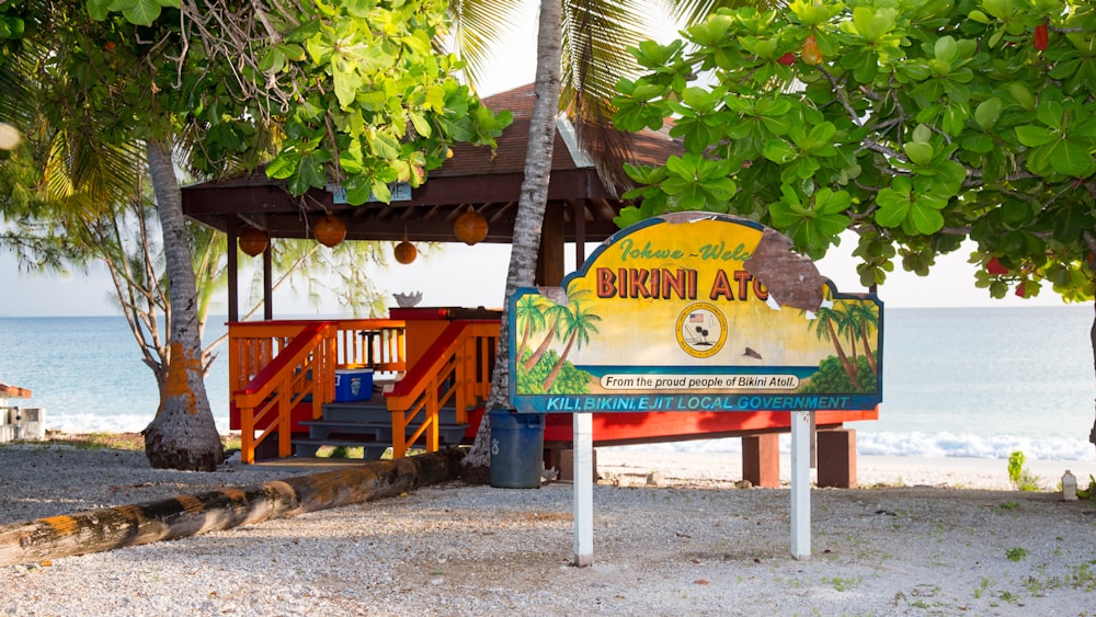 green and brown wooden signage