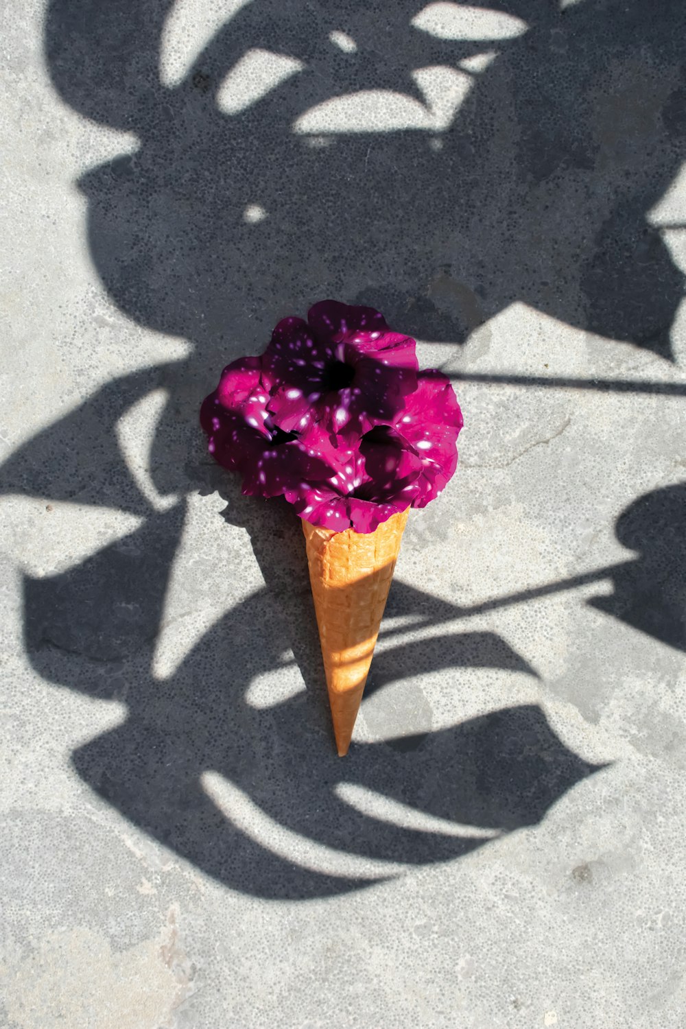pink ice cream on cone