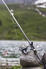 black and gray fishing rod