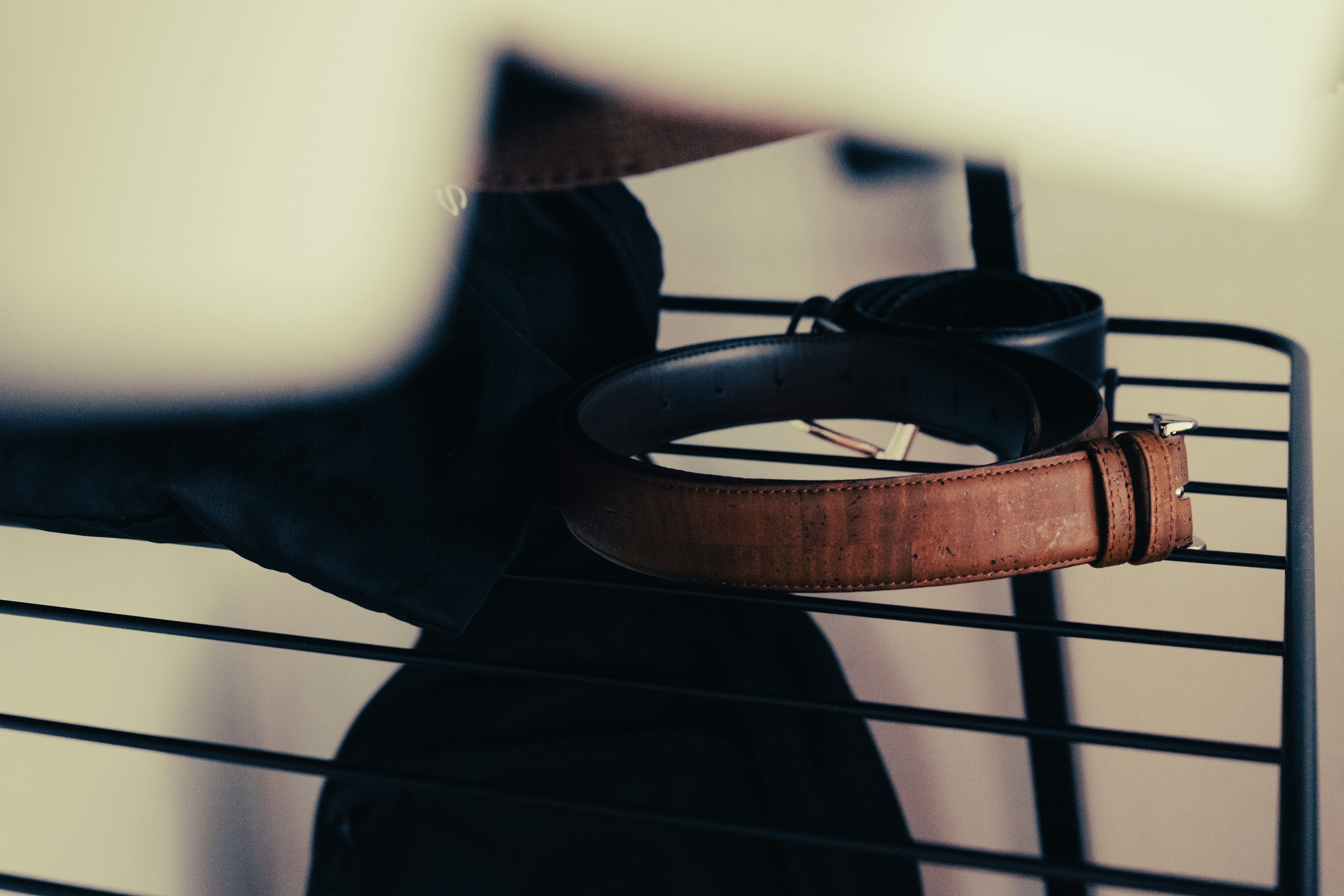 black and brown leather belt